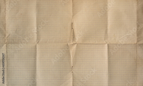 panoramic paper background - unfolded spread of old squared paper from a mid-twentieth century notebook
