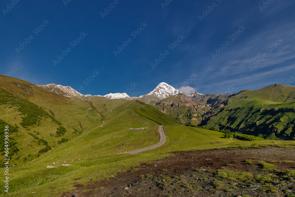 Fototapeta premium Kazbek or Kazbegi mountain,near the Gergeti Trinity Church ,Stepantsminda village in Georgia ,At an altitude of 2170 meters, 