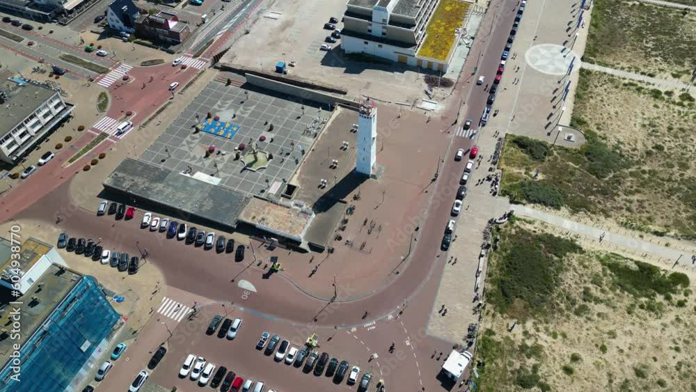 This aerial drone video shows the famous white lighthouse at the ...