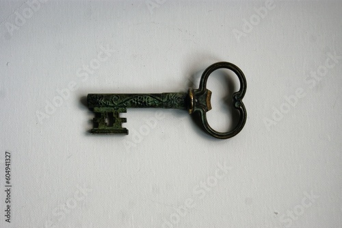 Old key with corkscrew in side. 