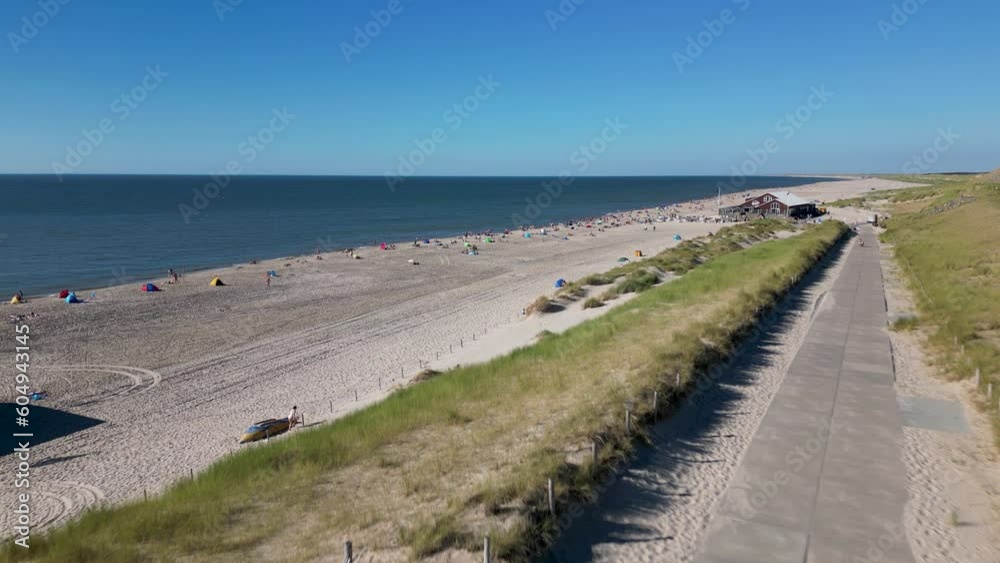 This aerial drone video shows the coastline near Petten. Enjoy the view of the beach and the dunes with the beautiful north sea in the background. 