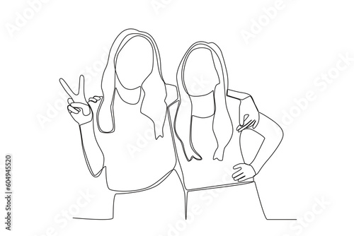 Two female friends posing. Friendship Day one-line drawing