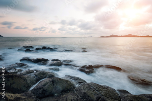 Sunset on the rocky shore.