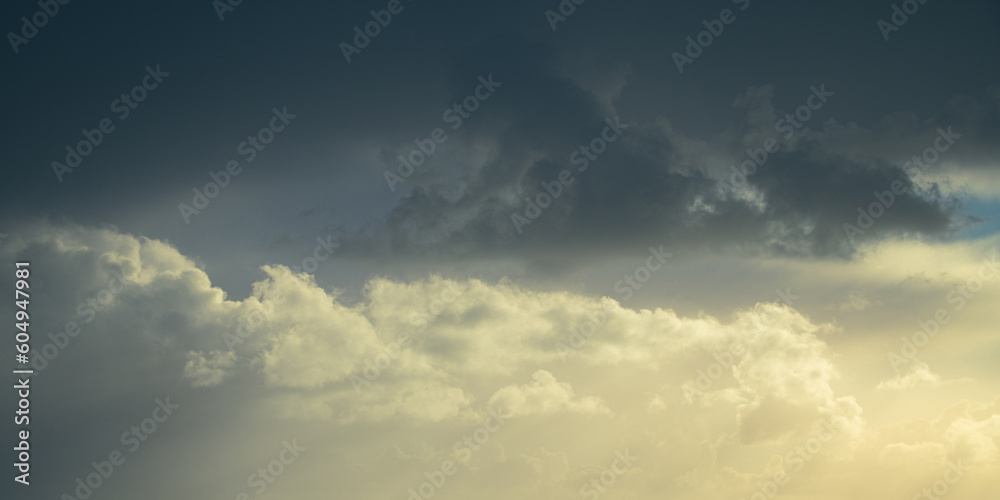 Thick gray clouds cover the sky, background. Cloudscape. Panoramic image. The vast clouds sky.
