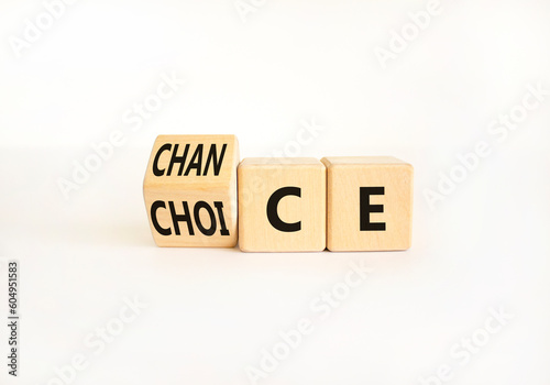 Choice and chance symbol. Businessman turns wooden cubes and changes the word Choice to Chance. Beautiful white table white background. Business choice and chance concept. Copy space.