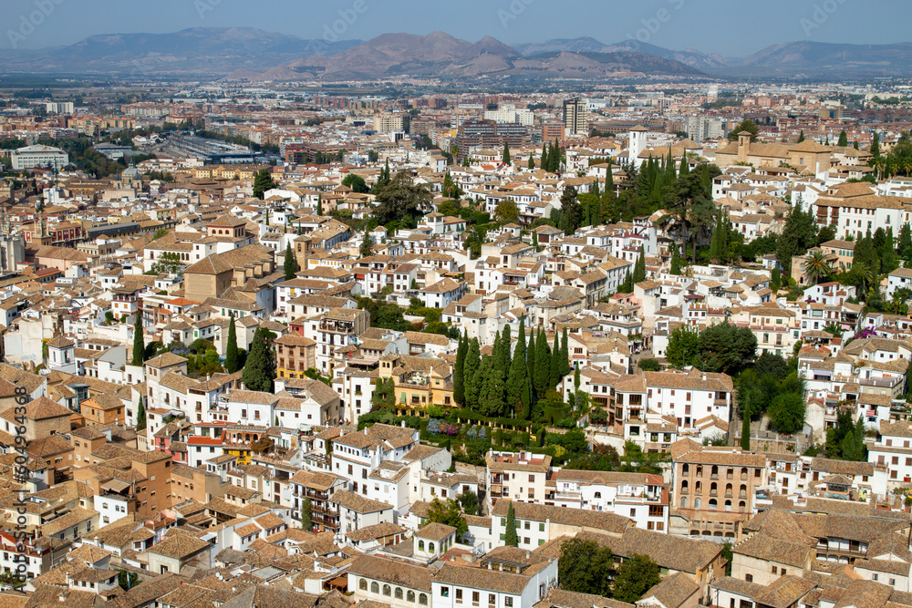 Architectural details of the Alhambra fortified palace complex and Granada city Architectural details of the Alhambra fortified palace complex and Granada city