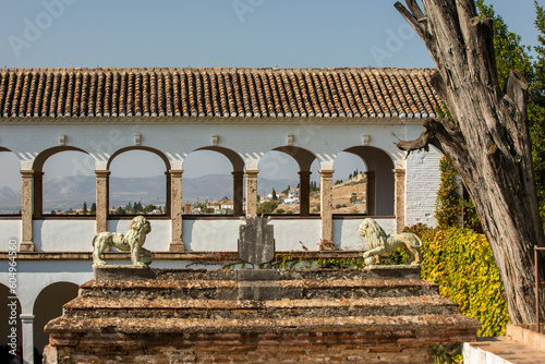 Architectural details of the Alhambra fortified palace complex and Granada city