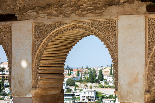 Architectural details of the Alhambra fortified palace complex and Granada city
