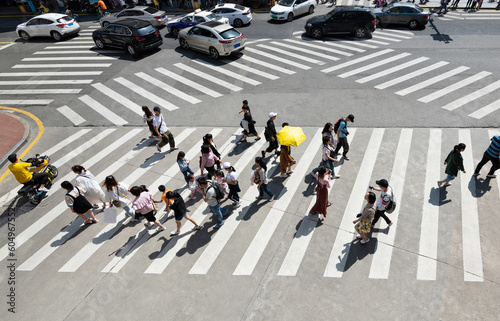 Group of people crossing the crosswalk