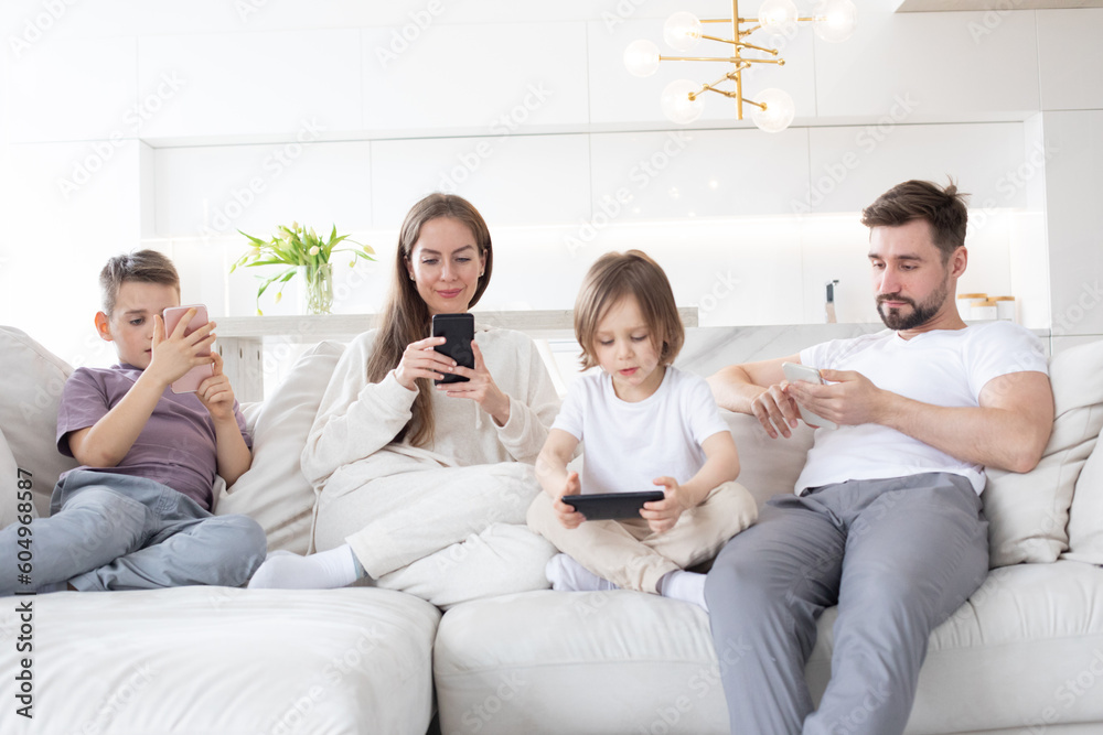 Fototapeta premium Family with smartphones at home