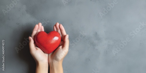 Young women hands holding red heart health care  donate and family insurance concept world heart day  world health day  CSR responsibility  adoption foster family  hope  gratitude  kind  generative ai