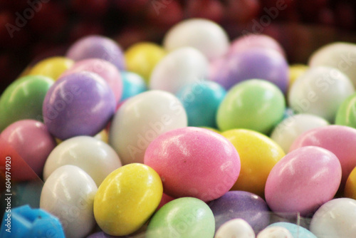 Obraz na płótnie delicious and traditional chocolate eggs covered in fun colors w salonie