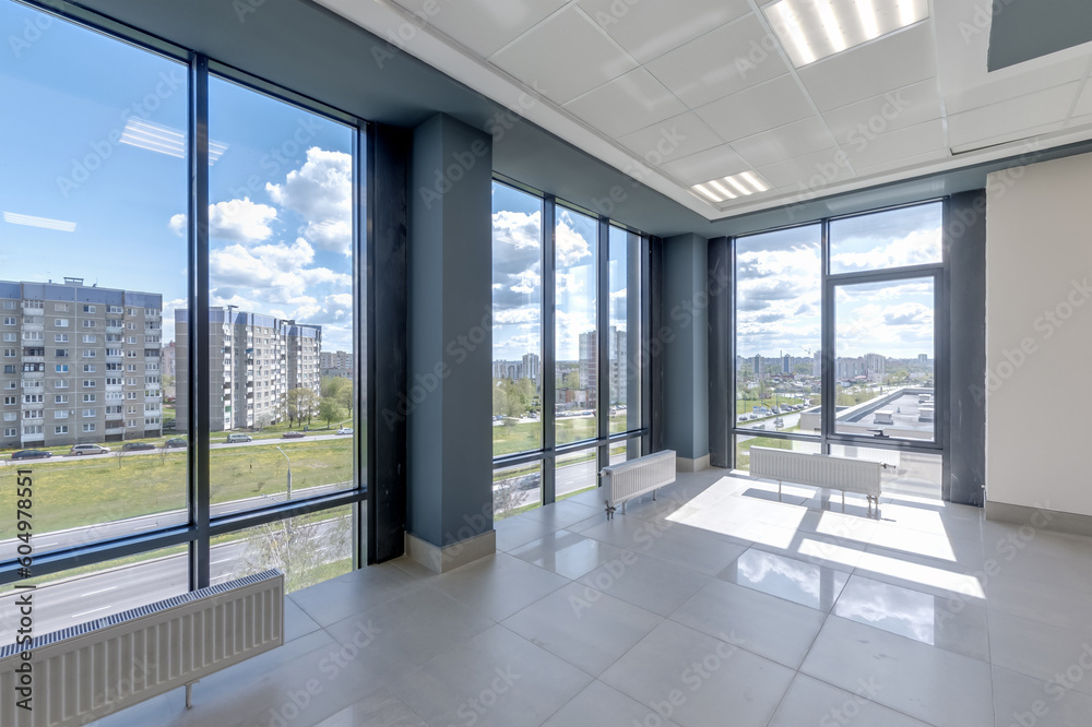 Fototapeta premium empty modern hall room with columns, doors and panoramic windows.