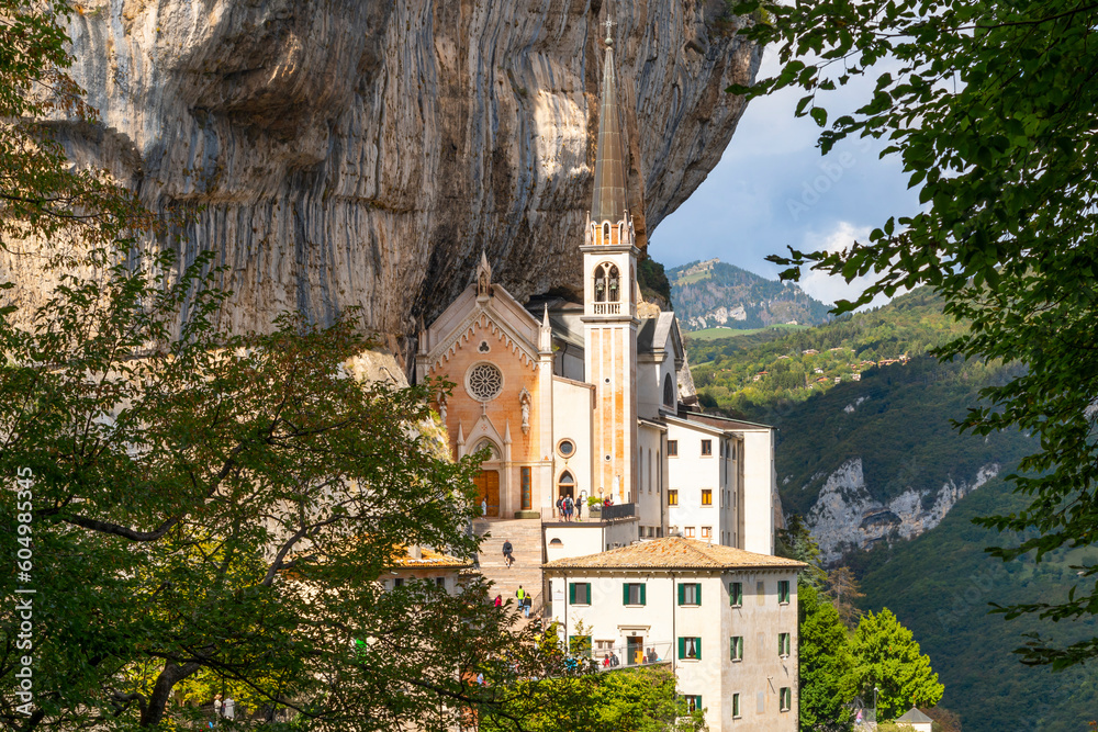 Close up of the imposing Madonna della Corona Sanctuary on the cliff edge of Mount Baldo in Spiazzi, Italy.