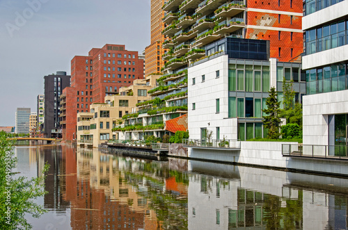 Photography Amsterdam, The Netherlands, May 14, 2023: colorful row of modern buildings refle