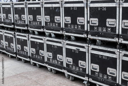 Black cases for musical equipment. Cases for audio equipment. Concept - brands of audio equipment. Rental of musical instruments. installation for organizing events in cases.