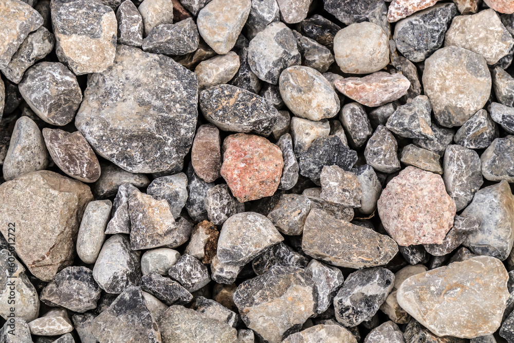 Building material stone rubble on road surface as background Building material stone rubble on road surface as background