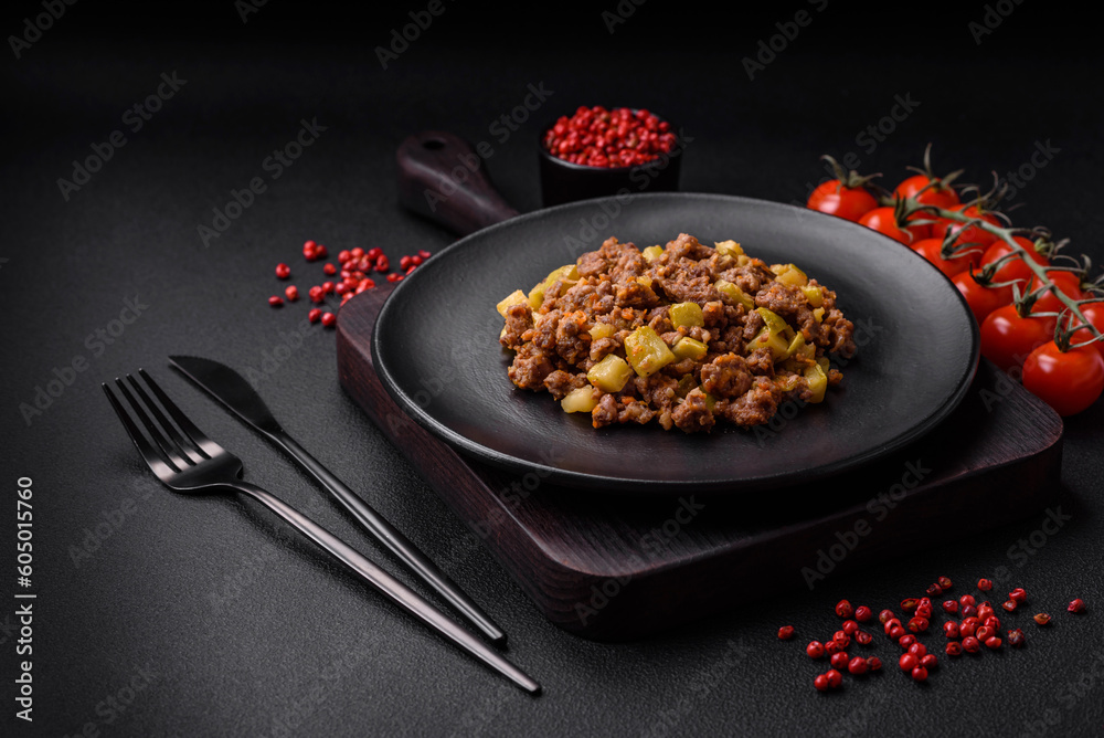Tasty dish consisting of zucchini, beef meat, mushrooms, onions and garlic Tasty dish consisting of zucchini, beef meat, mushrooms, onions and garlic