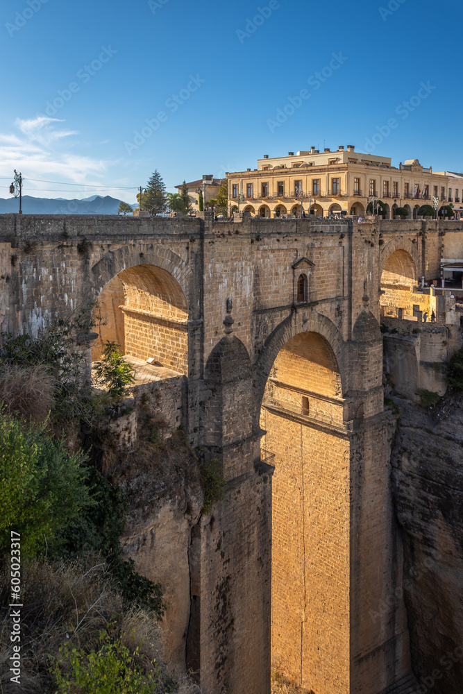 Beautiful exposure of the Ronda Bridge just before sunset showing this magnificent work of engineering, always very popular among tourists due to its beauty and magnificent views.