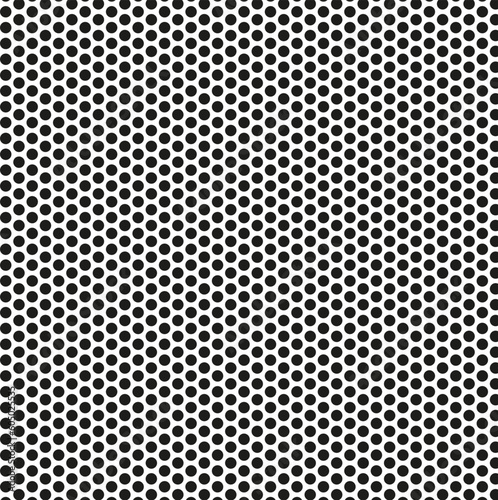 Seamless abstract geometric vector texture in the form of small black circles on a white background