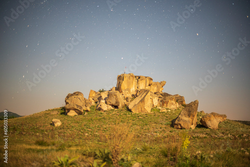 Photographs of the Phrygian valley and rock forms in the Afyon province at night under the Milky Way and the stars photo