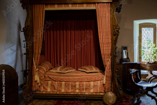 Vintage canopy bed in the castle. © Nataliya