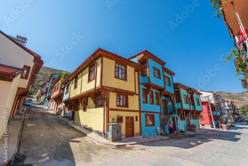 Colorful houses with local architecture in the lower part of the Afyon castle located on the top of the mountain © Aytug Bayer