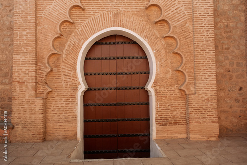 Schilderij op canvas Beautiful moorish arch door entrance to a mosque in the  Marrakech Medina of Mor