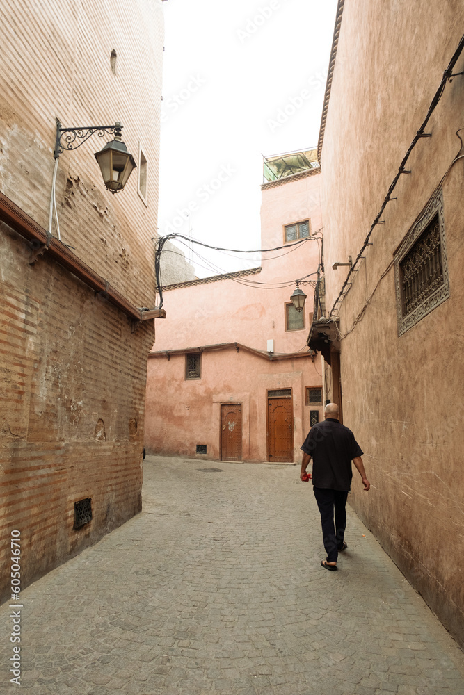 Man walking in the Marrakech Medina of Morocco