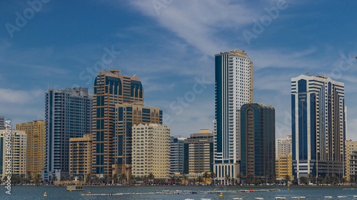 Sharjah city view  high rise buildings with lagoon