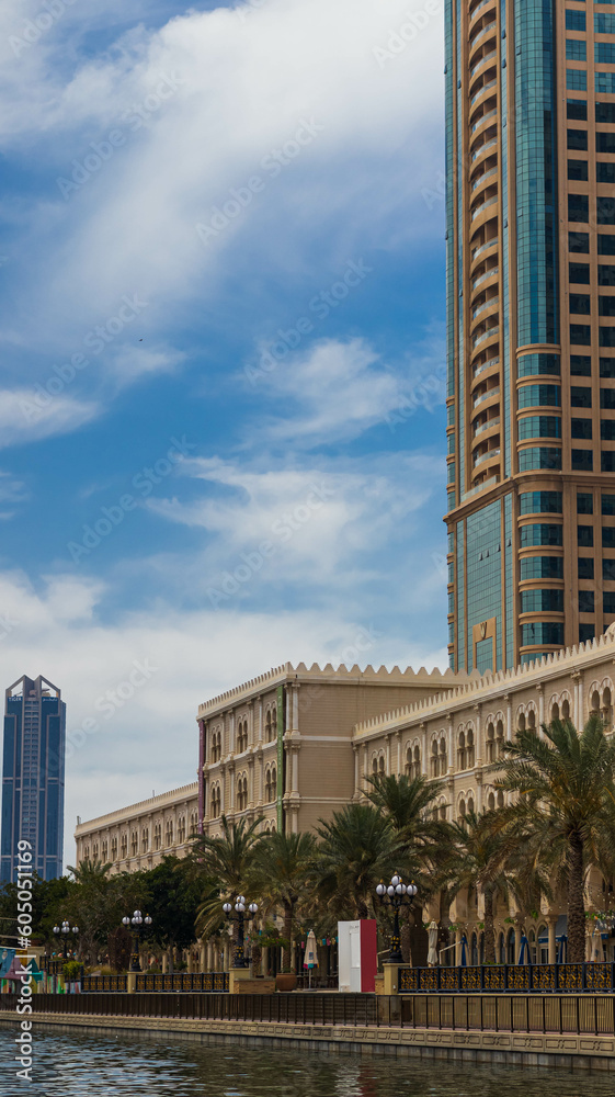 Sharjah city view, high rise buildings with lagoon