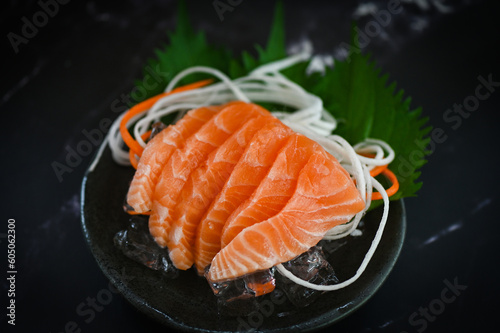 fresh raw salmon fish for cooking food seafood salmon fish, salmon sashimi food salmon fillet japanese menu with shiso perilla leaf lemon herb and spices