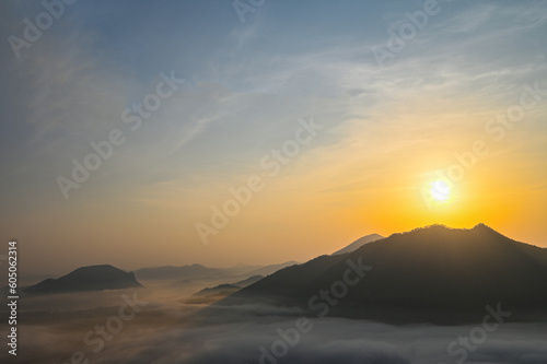 landscape forest in the morning beautiful sunrise mist cover mountain background  winter foggy view at beautiful misty spring mountain valley  and mountains in mist on background
