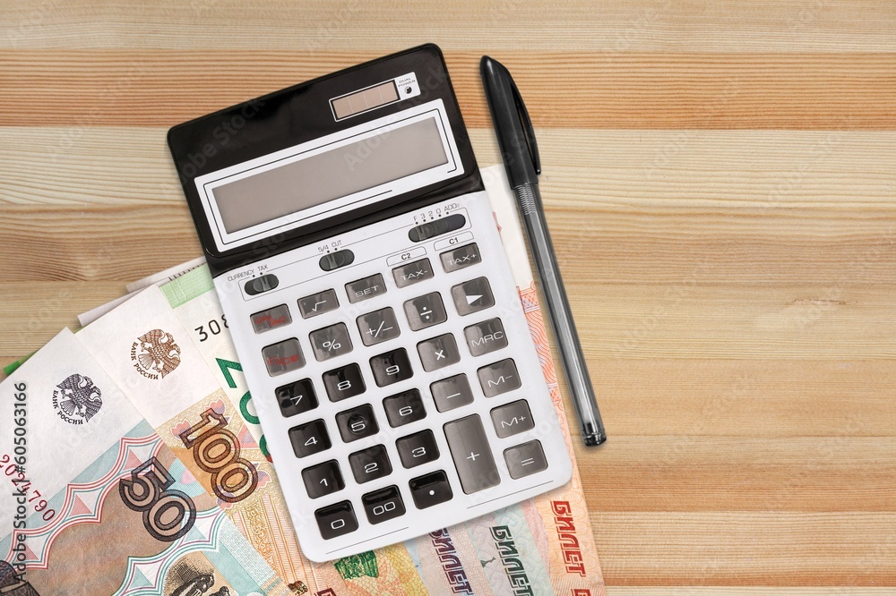 2023 on office calculator and banknotes, budget concept 2023 on office calculator and banknotes, budget concept