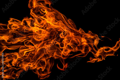 Fire flame on black background, abstract texture 
