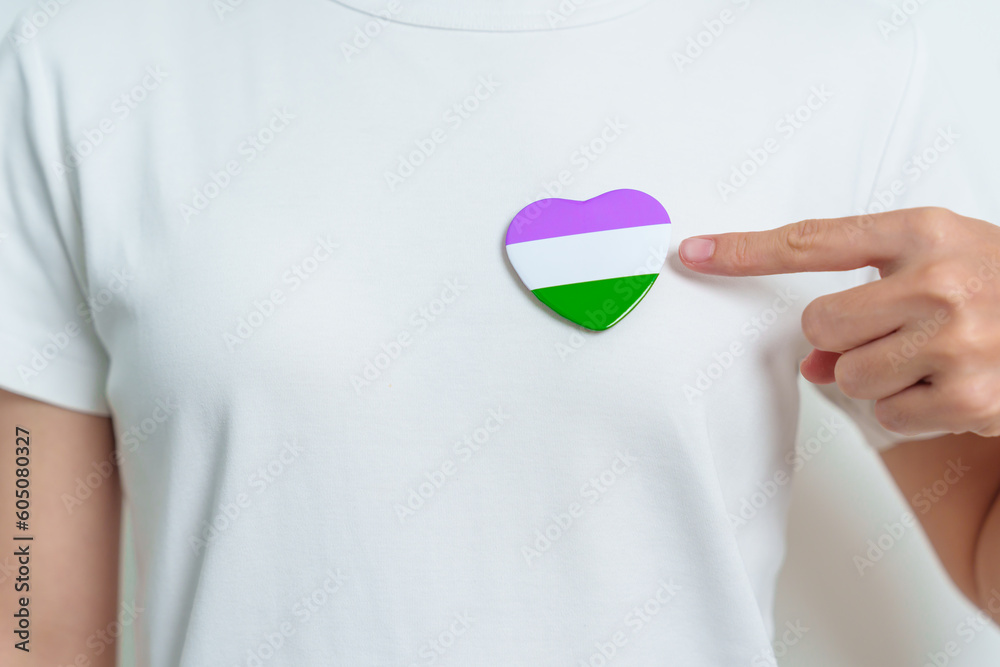 Queer Pride Day and LGBT pride month concept. purple, white and green heart shape for Lesbian, Gay, Bisexual, Transgender, genderqueer and Pansexual community Queer Pride Day and LGBT pride month concept. purple, white and green heart shape for Lesbian, Gay, Bisexual, Transgender, genderqueer and Pansexual community