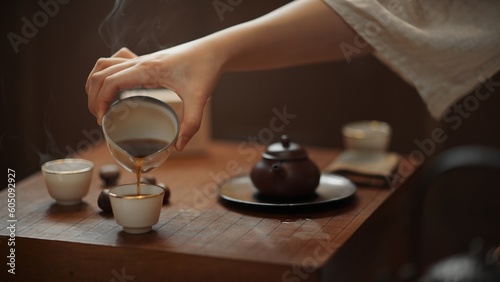 Minimalist art of making tea - A woman demonstrates a graceful tea-making style