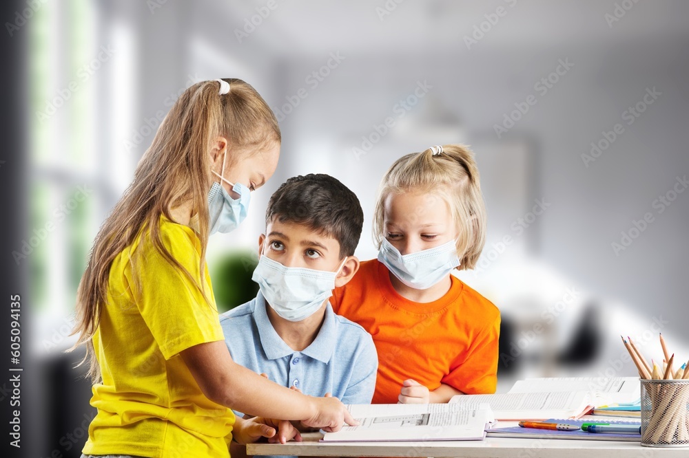 Happy school friends children in classroom interior Happy school friends children in classroom interior