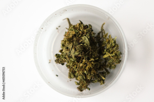 Dried cannabis in container