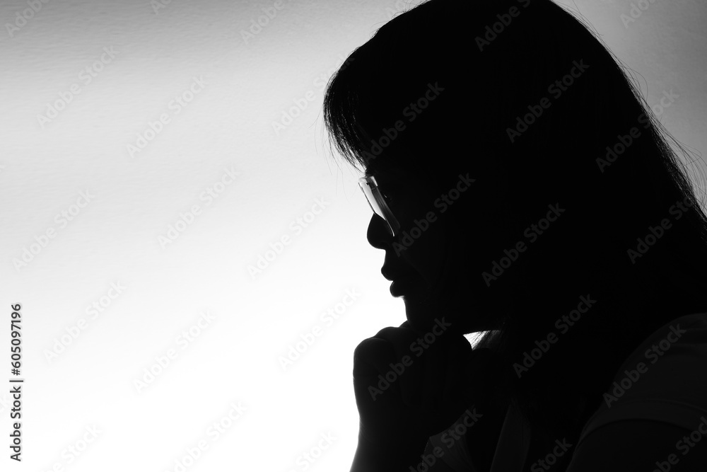 silhouette of woman with down syndrome,backlight silhouette of woman with down syndrome,backlight