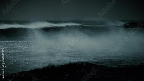 Night version, ocean waves in moonlight - shot at 60fps slowed. Moon rays shinning down on surface.