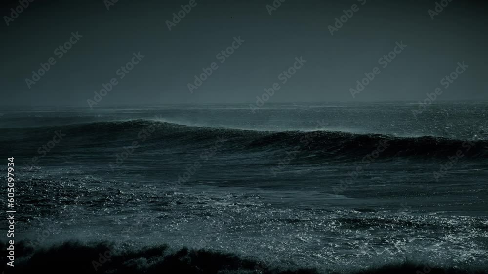 Night version, ocean waves in moonlight - shot at 60fps slowed. Moon rays shinning down on surface.