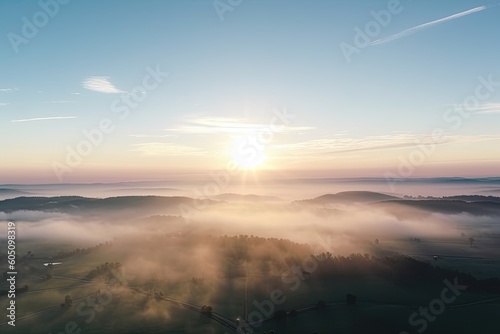 Amazing plane Aerial view 180 degrees panoramic of Morning sunrise above the clouds in the sky with copy space.AI Generated © PapatoniC