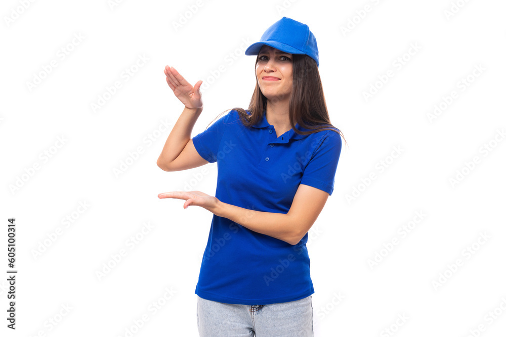 attractive pretty young caucasian brunette advertiser woman dressed in clean blue t-shirt and cap with print mockup attractive pretty young caucasian brunette advertiser woman dressed in clean blue t-shirt and cap with print mockup