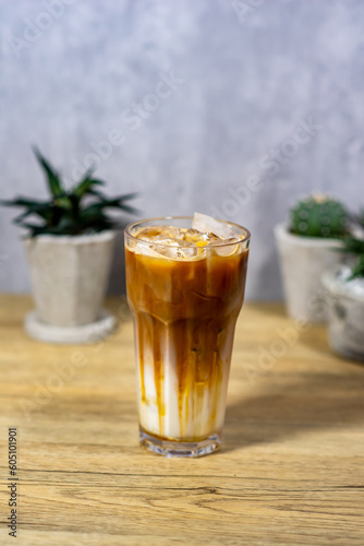 honey milk coffee on wooden table