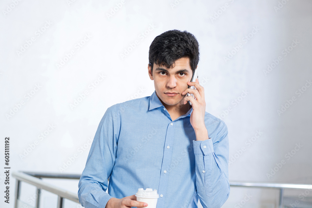 young businessman talking on his cell phone