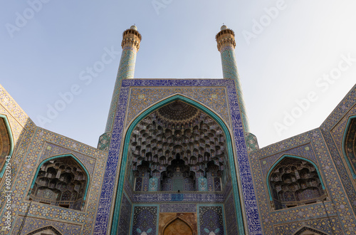 Facade of main entrance iwan of Shah Mosque on south side of Naghsh-e Jahan Square, Isfahan, Iran. UNESCO World Heritage. Architectural masterpiece.