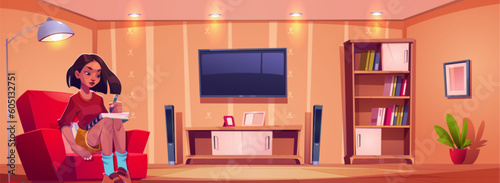 Living room furniture and girl sitting on armchair and learning. Woman in cozy modern apartment sit alone and writing in notebook with lamp. Indoor teen lifestyle. Tv and indoor light wallpaper