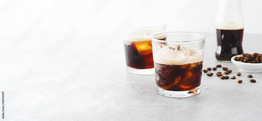 Iced Coffee, Sparkling or Cold Brew Coffee with Ice on Bright Background, Coffee Cocktail, Refreshing Beverage Iced Coffee, Sparkling or Cold Brew Coffee with Ice on Bright Background, Coffee Cocktail, Refreshing Beverage
