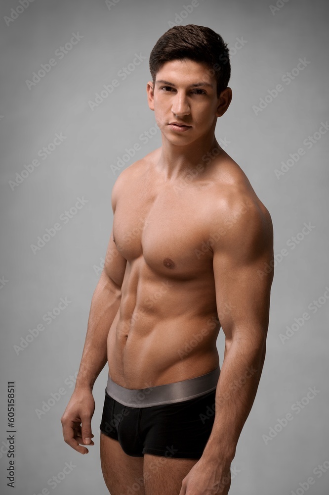 Fitness sporty young male model posing